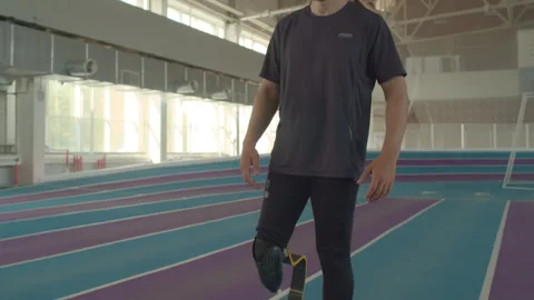 Para-athlete with Running Blade Preparing for Race Video stock 259286930