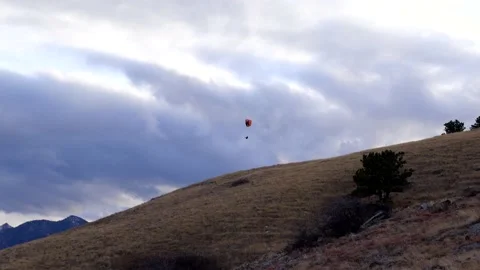 Para glider flying over Boulder, Colorado Stock Footage 154594514