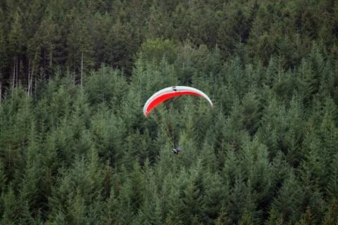 Para glider in front of mountain Stock Photos