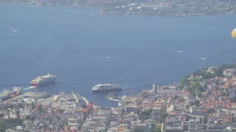 Para Glider in front of urban area at the sea Stock Footage 41461673