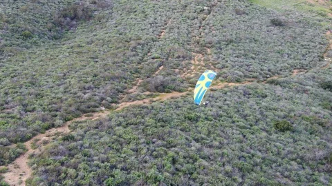Para-glider over the top of the mountain during summer sunny day Stock Footage 126415635