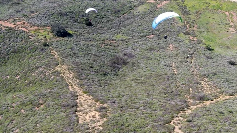Para-glider over the top of the mountain during summer sunny day Stock Footage 126415879