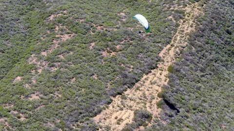 Para-glider over the top of the mountain during summer sunny day Stock Footage 126416278