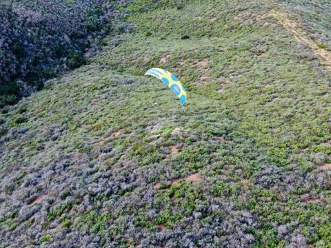 Para-glider over the top of the mountain during summer sunny day Fotos Stock
