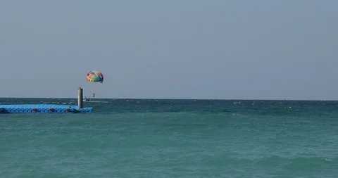 Para glider Paragliding Against security camera 스톡 동영상 98045141