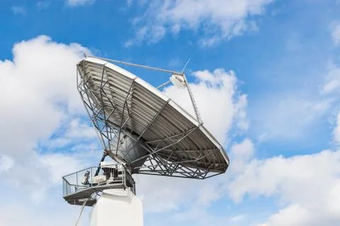 Parabolic satellite antenna for wireless data transfer Stock Photos