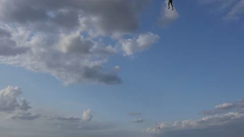 Parachute on the blue sky Stock-Footage 159480123