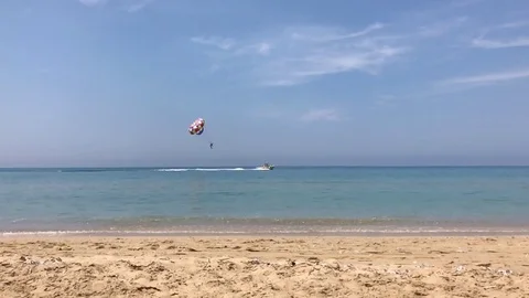Parachute with boat on the sea,slow motion Stock Footage 80092359