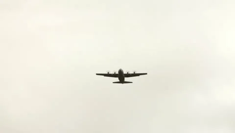 Parachute Drop out of a C-130 (HD)m Stock Footage 11236100