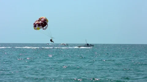 Parachute flight by boat Video stock 94912811