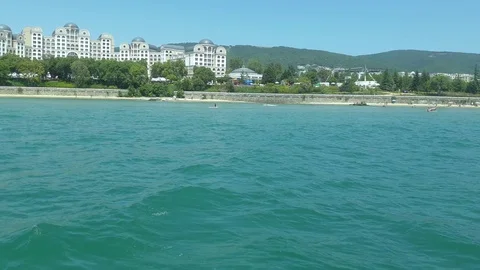 Parachute flight over the coast. Video stock 113399438