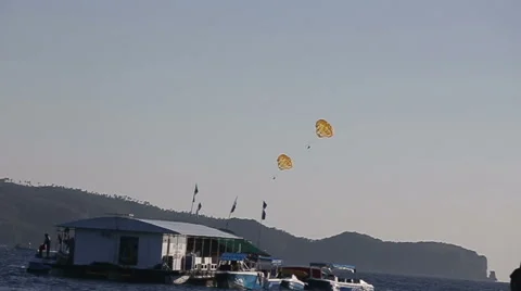 Parachute flying over the ocean Stock Footage 53278595
