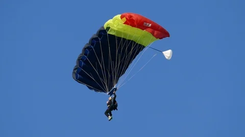 Parachute jumper doing demonstrations at one air show Stock Footage 91703171