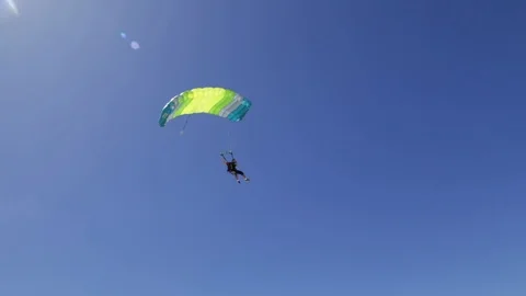 Parachute landing on the beach Stock Footage 88383795
