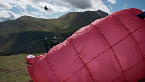 Parachute lying on the ground Video stock 172536383