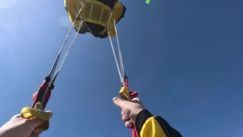 A parachute opens Stock Footage 306275139