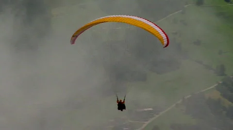 Parachute - paraglider out of clouds Stock Footage 623258