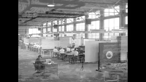 Parachute Rigger students learn sewing and parachute repairs at the Maintenance Stock Footage 79423911