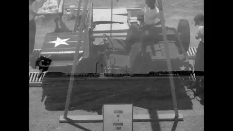 Parachute riggers practice rigging heavy equipment in the 1960s. Stock Footage 79522551