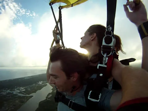 Parachute spinning over landscape Stock Footage 24674713