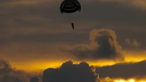 Parachute in the sunset sky Video stock 172045048