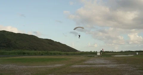 Parachuters Land On Ground 스톡 동영상 79737149