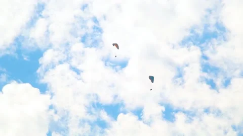 Parachutes in front of the clouds at Manali in Himachal Pradesh, India.  Stock Footage 172578634