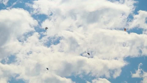 Parachutes in front of the clouds at Manali in Himachal Pradesh, India Stock Footage 175780068