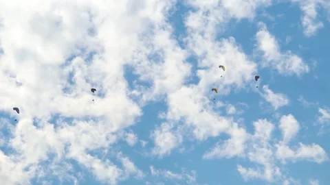 Parachutes in front of the clouds at Manali in Himachal Pradesh, India.  Stock Footage 182459306