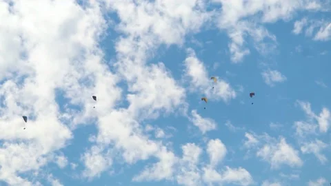 Parachutes in front of the clouds at Manali in Himachal Pradesh, India.  Stock Footage 182460091