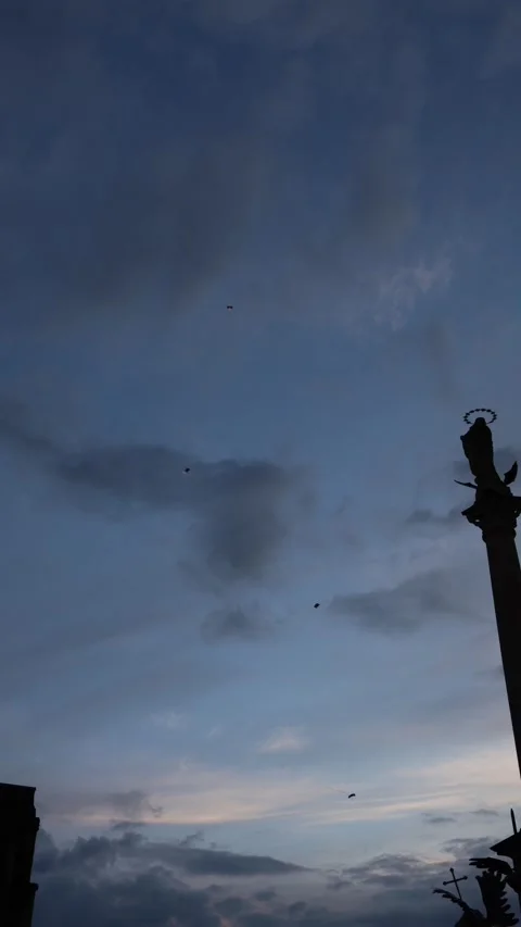 Parachutes in twilight sky Stock Footage 335141084