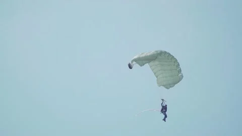 Parachuting action by the Indonesian Air Force Stock Footage 239403036