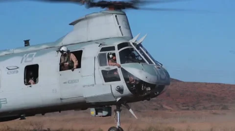 Parachuting out of CH-46 Sea Knight helicopters Stock Footage 39780201