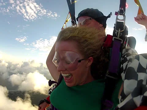 Parachuting over landscape Stock Footage 24674090