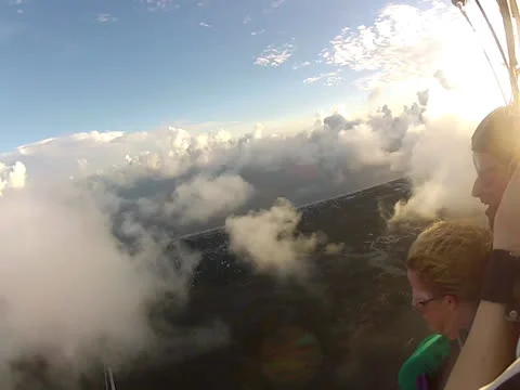 Parachuting through cloud Stock Footage 24674881