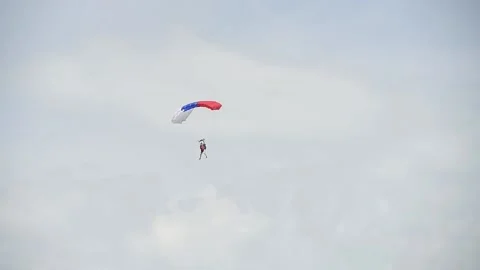 Parachutist on the background of blue sky 動画素材 155540201