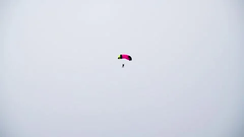 Parachutist on the background of blue sky Stock Footage 273197809