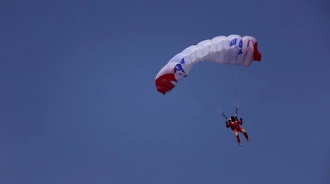 Parachutist in the blue sky Stock Footage 67559323
