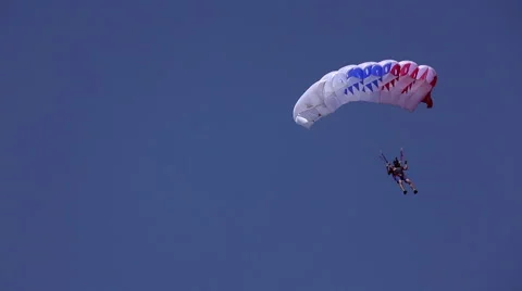 Parachutist in the blue sky Stock Footage 67559338