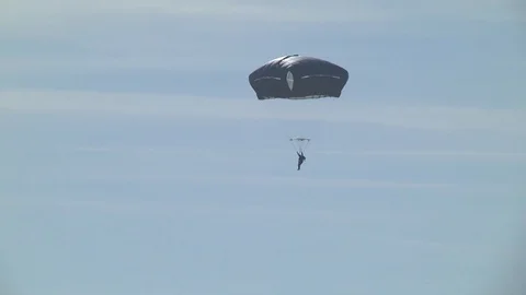 Parachutist descending Stock Footage 85597876