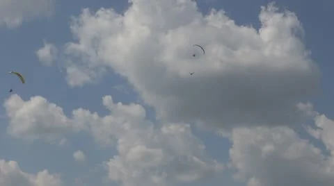 Parachutist flying in cloudy day Stock Footage 11239795