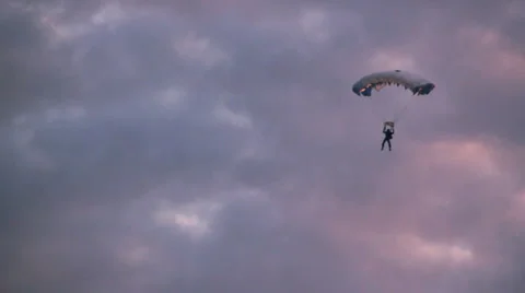 Parachutist flying in the cloudy sky Video stock 904202