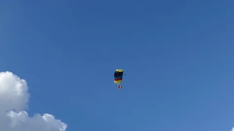 Parachutist with the romanian flag Stock Footage 103276152