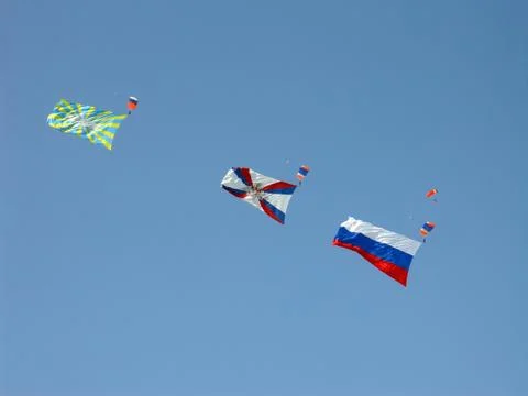 Parachutists with flags Stock Photos