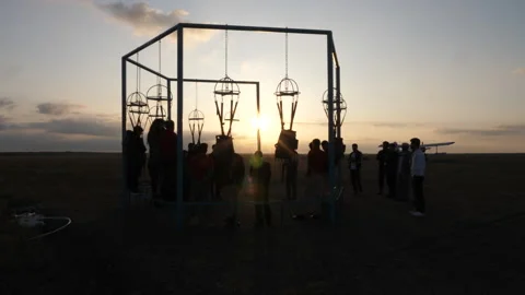 Parachutists group hangs on special simulator construction Stock Footage 144345622
