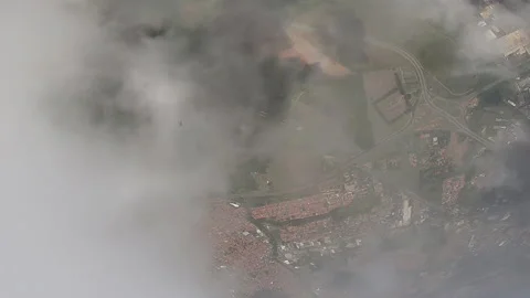Parachutist's point of view when crossing the clouds and seeing his own shadow. Stock Footage 143935047