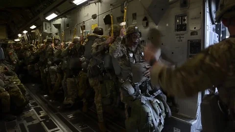Parachutists ready to perform static line jump Stock Footage 90939552