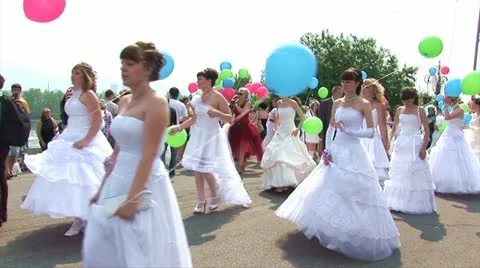 Parade of brides (with baloons) Stock Footage 11291142