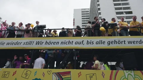 A parade float displaying the slogan Wir hoeren nicht auf bis alle gehoert Video stock 346238704