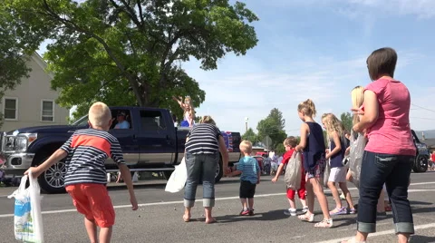 Parade rural community candy throwing kids 4K 004 Stock Footage 52238744